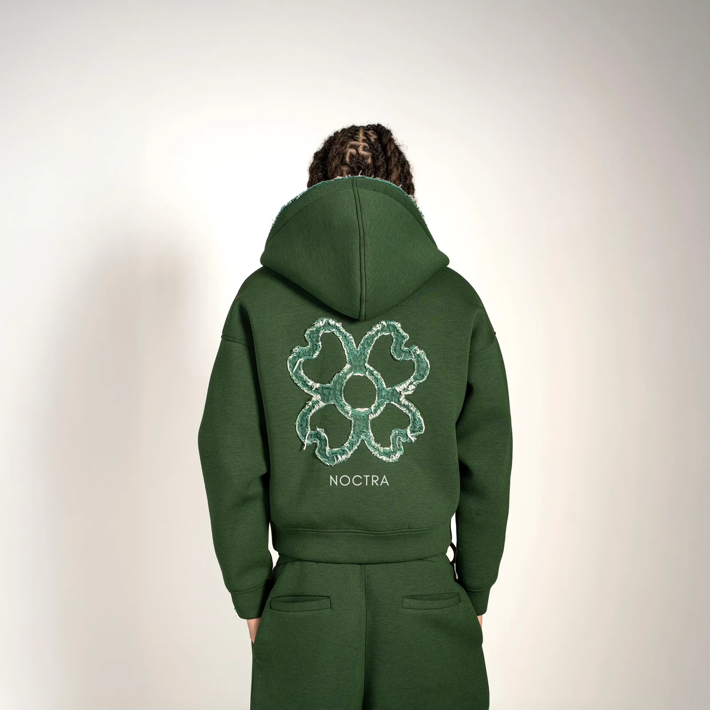 NOCTRA veste Signature