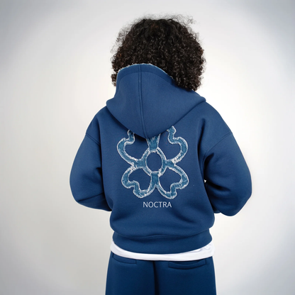 NOCTRA veste Signature